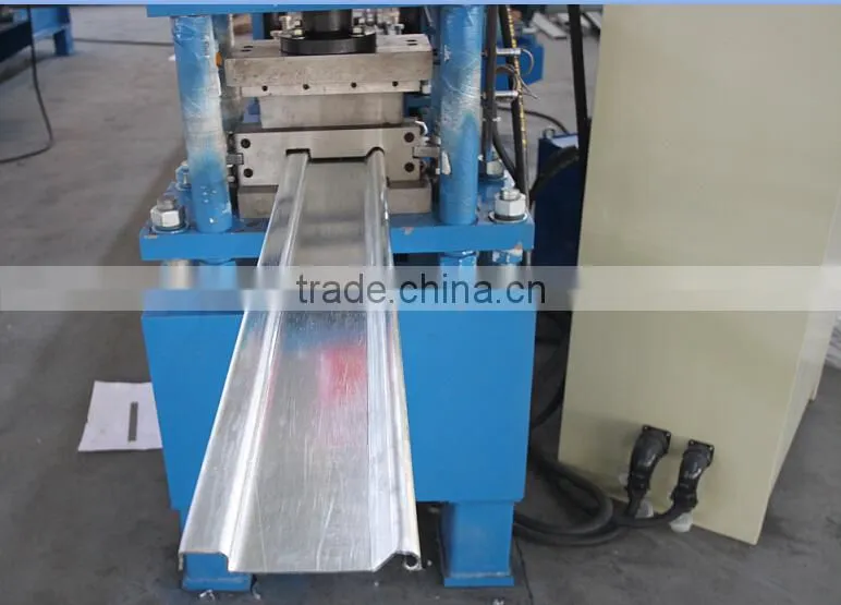 New Type Color Steel Sheet Roller Shutter Door Roll Forming Machine With Punching, Rolling Shutter Slats Roll Forming Machine