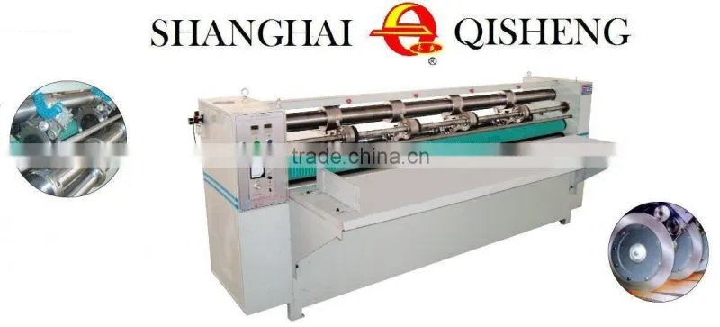 Automatic corrugated paperboard slitting scorer