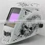 Automatic welding lens