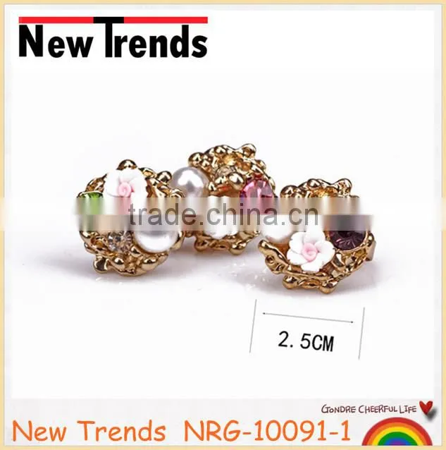 Fancy flower pearl gold ring designs with large crystal