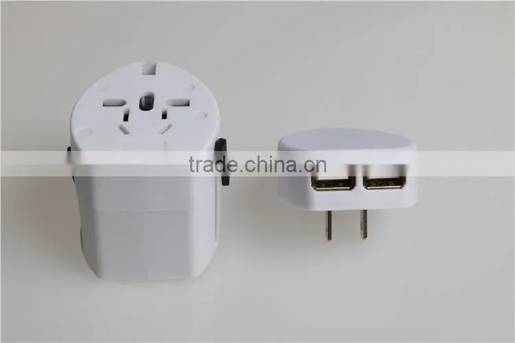 Hot selling dual USB universal adapter set with 100mA output travel adapter set with UK/EU/AU/US plug for mobile phone
