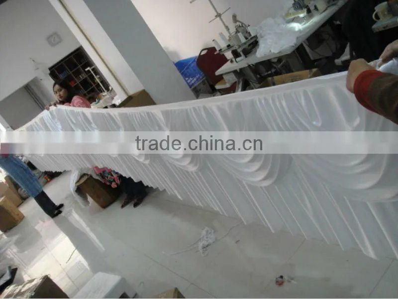white ice silk table skirt with tapes at back with detachable white swag table sikrt