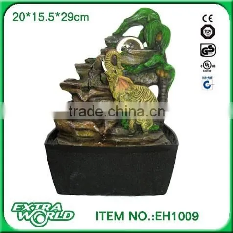 resin craftwork water fountain with colorful bird