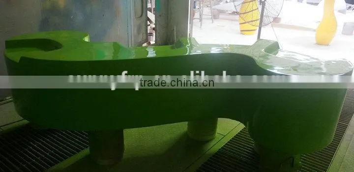 Big green fiberglass leisure chair