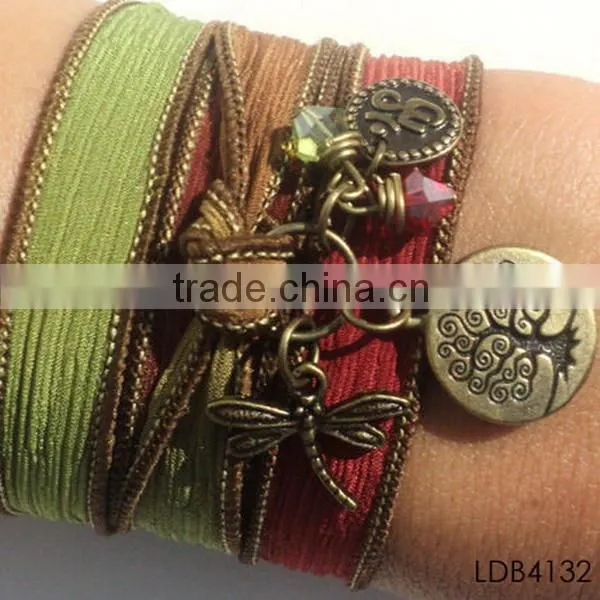 Fashion ribbon bracelet with gold plated dragonfly and tree china supplier