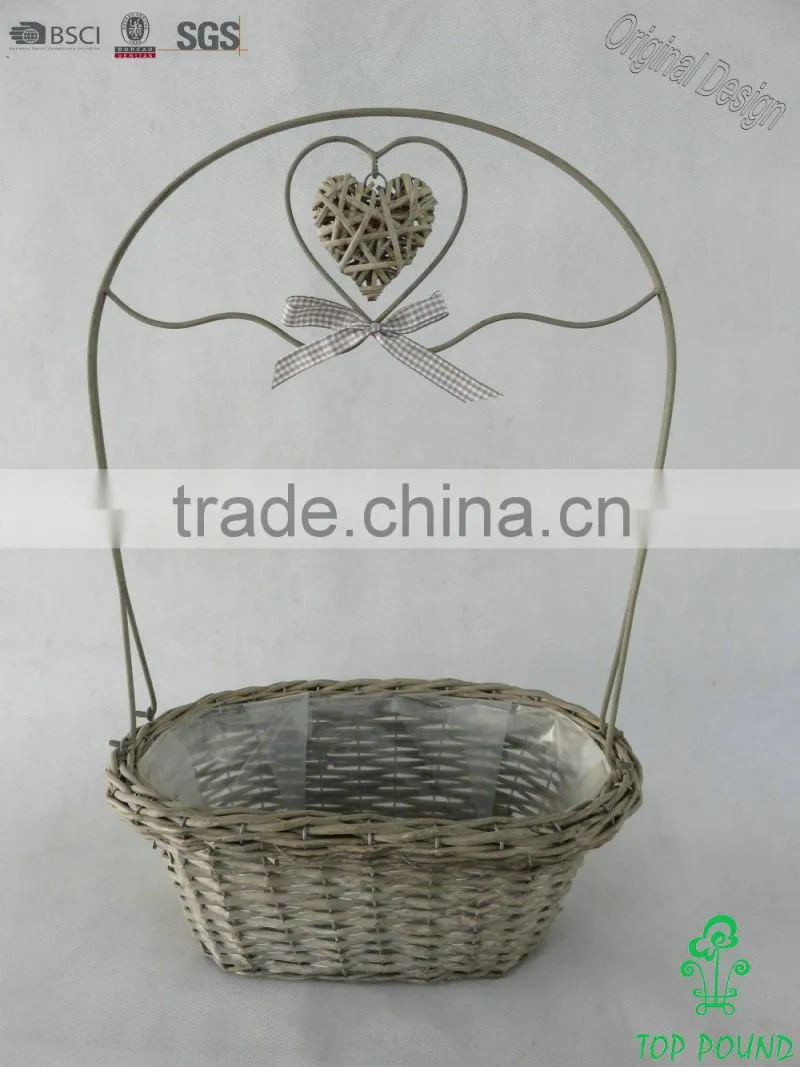 Decorative wicker heart oblong basket with KD metal handle and ribbon bow