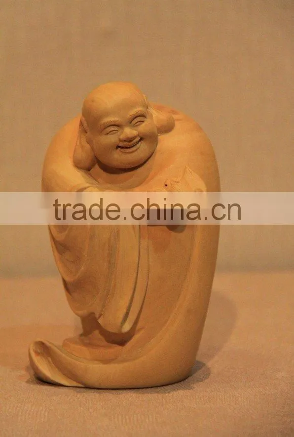 wood carving buddha