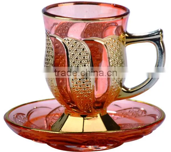 Golden tea cup and saucer set