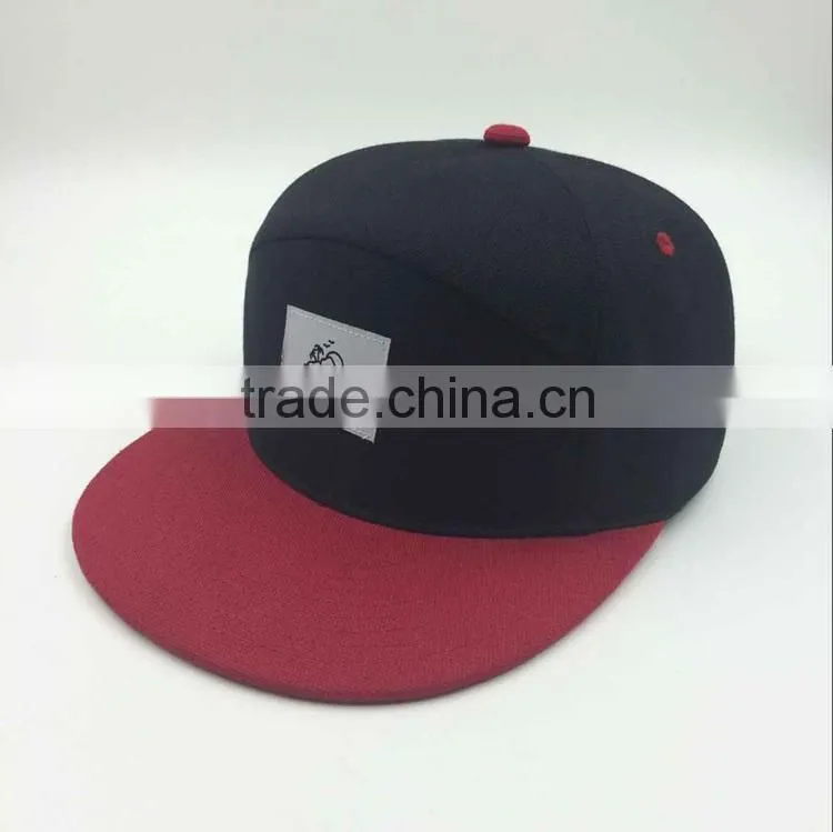 wholesale custom design your own logo 7 panel black snapback hat with woven label