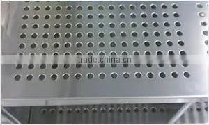 Perforated metal division plate