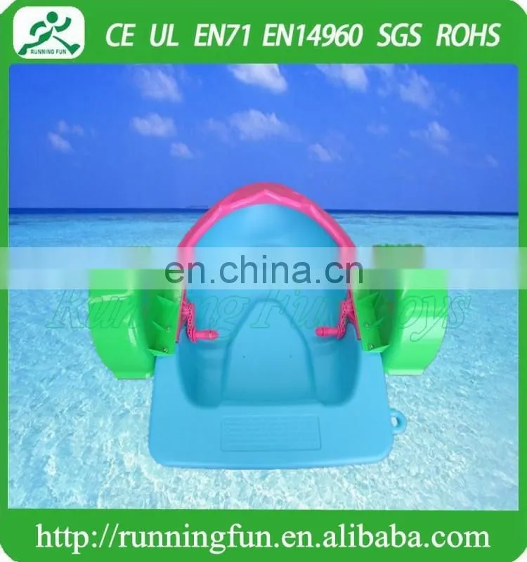 Kids plastic boats, handing paddle boats