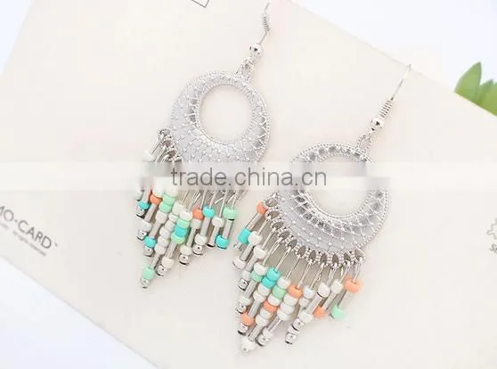 Cheap China beautiful handmade light bead tassel earrings