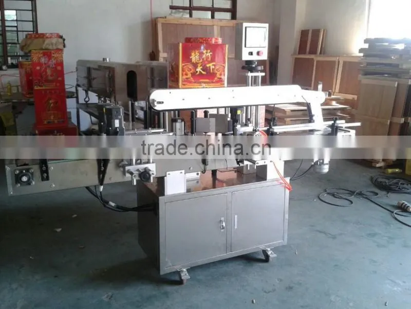 Automatic self-adhesive bottle labeling machine