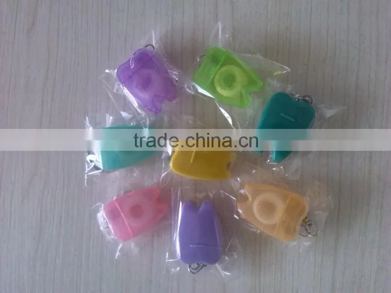 Nylon bristle tooth brush with dental floss and dental floss pick
