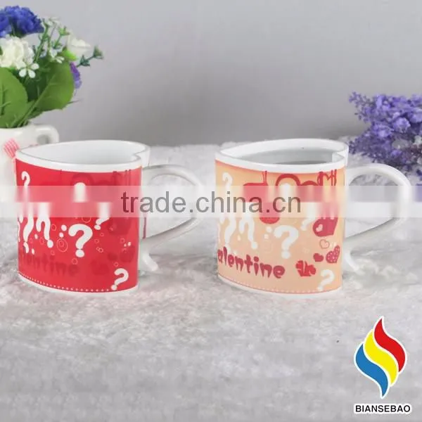heart shape ceramic mug with revolving logo