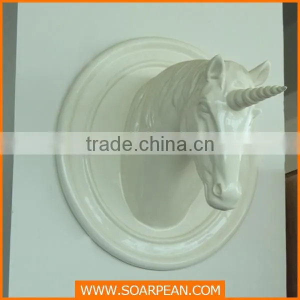 golden fiberglass horse head sculpture