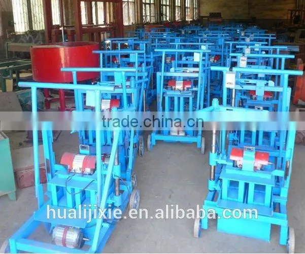mini egg-laying cement brick making machine QMR2-45 laying a concrete block used