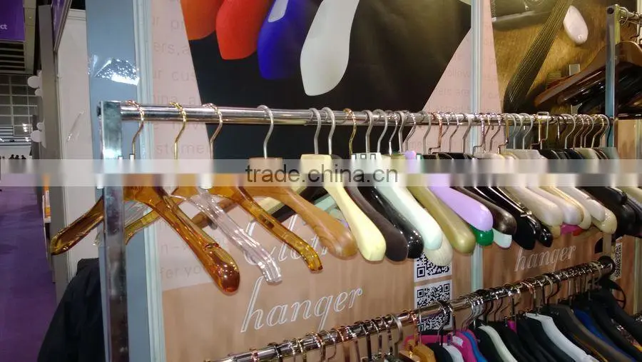 Gold wire coat hangers for luxury garment brand store use
