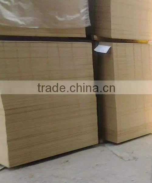 Hand grasps laminated floor
