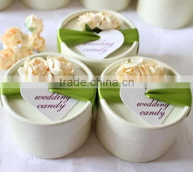 Customized handmade ivory wedding candy box with ribbon and flower