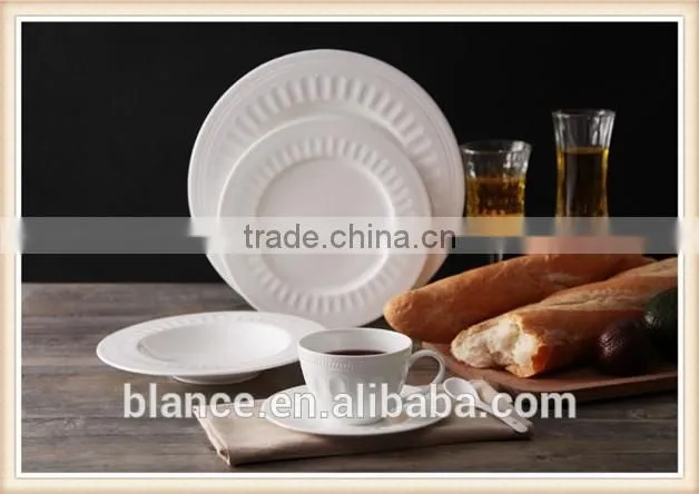 white ceramic European coffee cup set