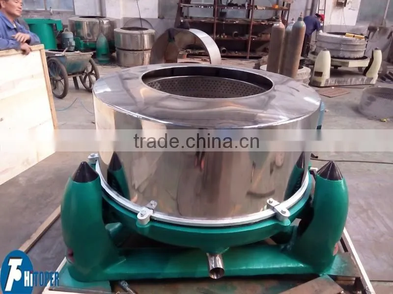 Manual feed and discharge type basket centrifuge, basket centrifuge operation