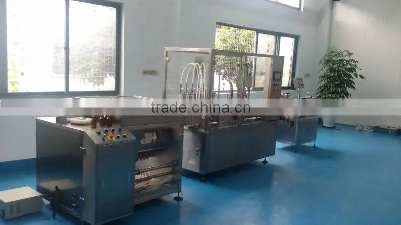 Auto massage oil filling and capping machine