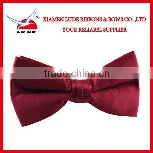 Wholesale Fasion satin ribbon bow with elastic band for packing.