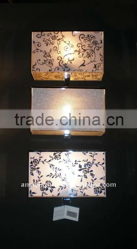 antique sconce with three shades by Amay Lighting MB912