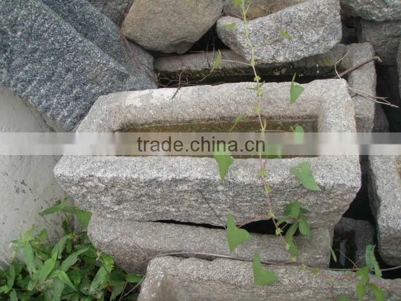 Antique stone troughs