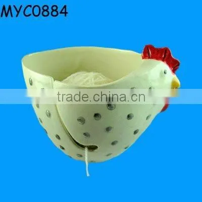 Ceramic pink bowl as yarn closet organizer
