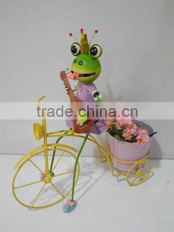 Colorful frog with bicycle for stores