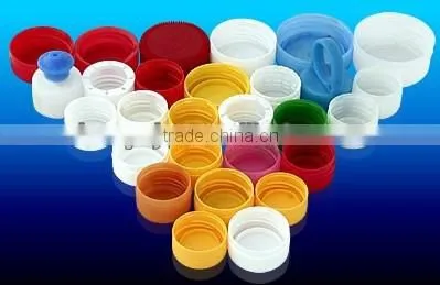 Plastic bottle and cap moulding machine