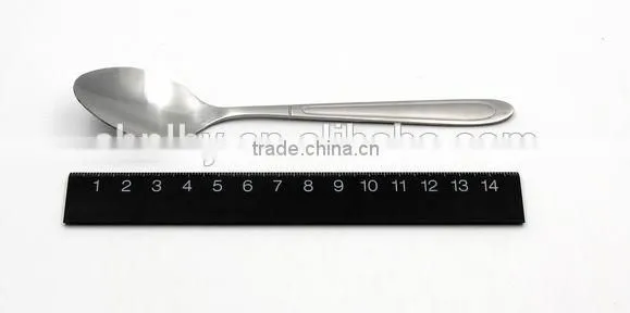 Modern stainless steel cocktail spoon in the bar