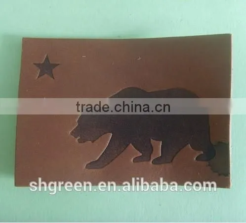 Embossed bear logo leather label for suits