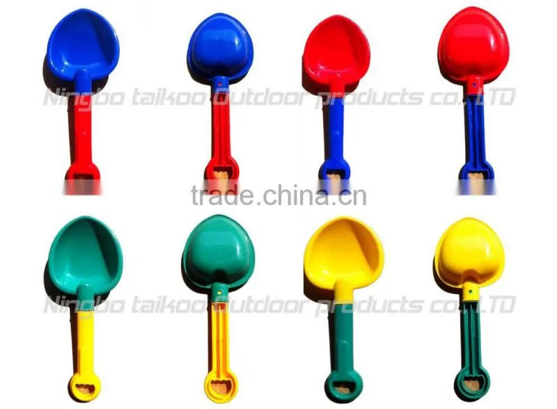 small colorful beach/snow/children plastic shovel spoon