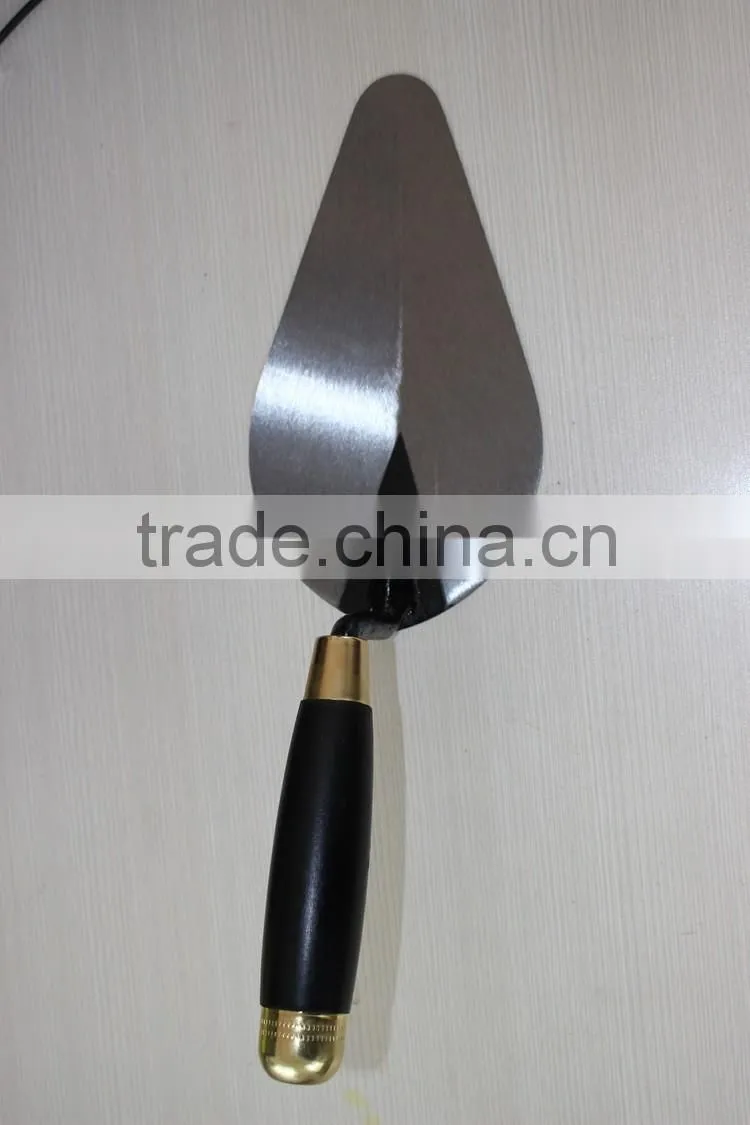 Bricklaying trowel with wooden handle