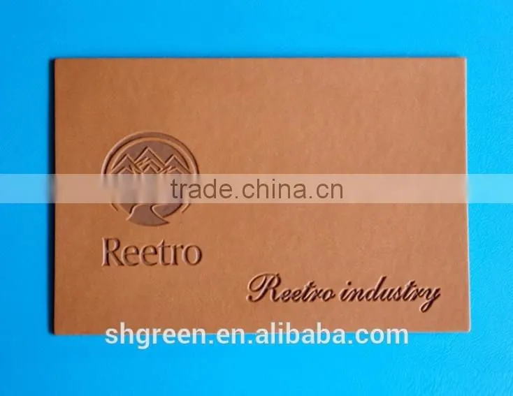 Embossed bear logo leather label for suits
