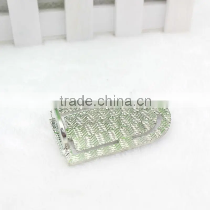 Small icon with metal holder