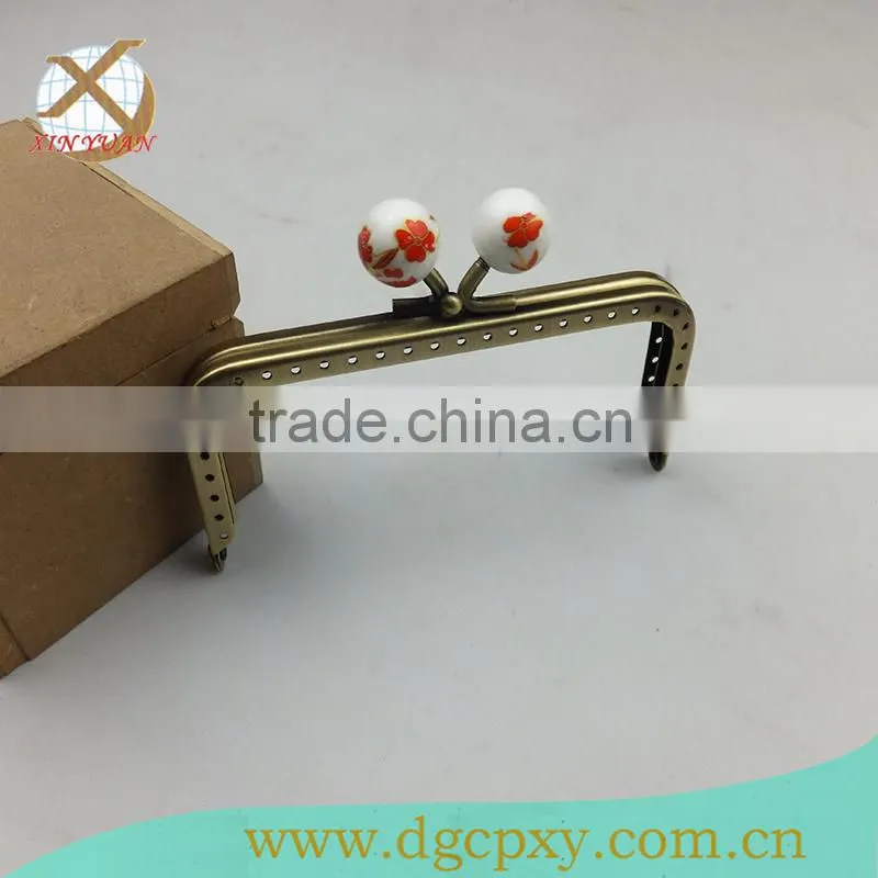 ceramic head metal frame for purse