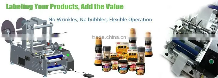 Semi automatic hand labeler for round bottles