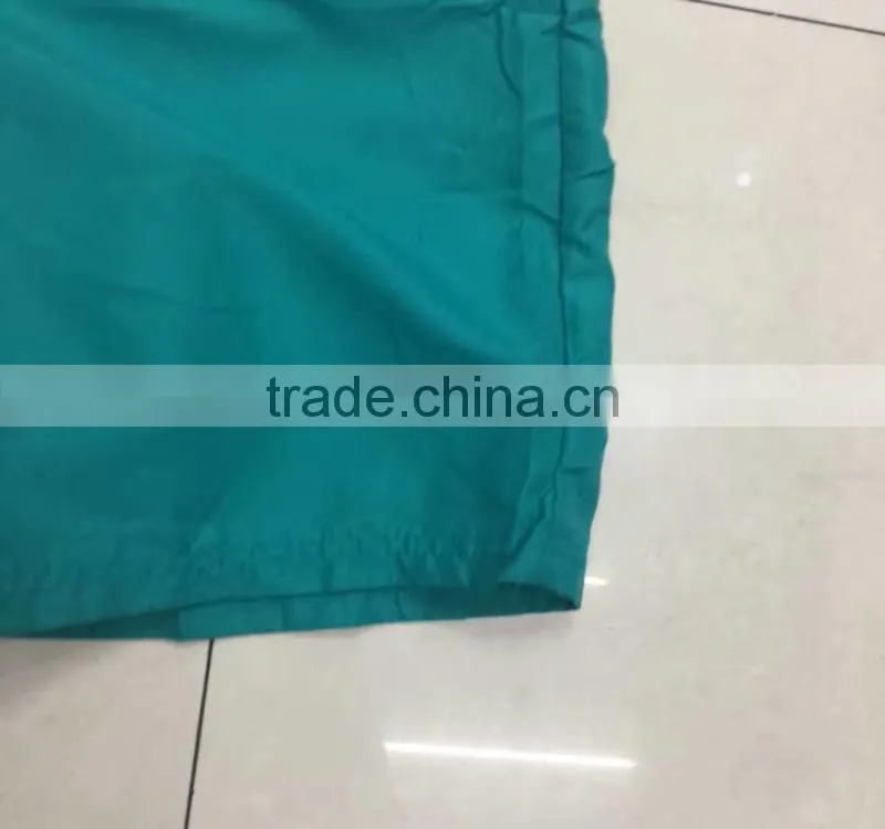 China stocklots men 100%polyester pure color bermuda shorts