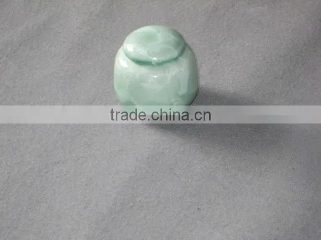 Small memorial urns and vases for human and pet