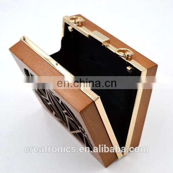CR Factory OEM acceptable engraving patterns hollowed-out design metal frame long chain rectangled shaped wooden box clutch bag