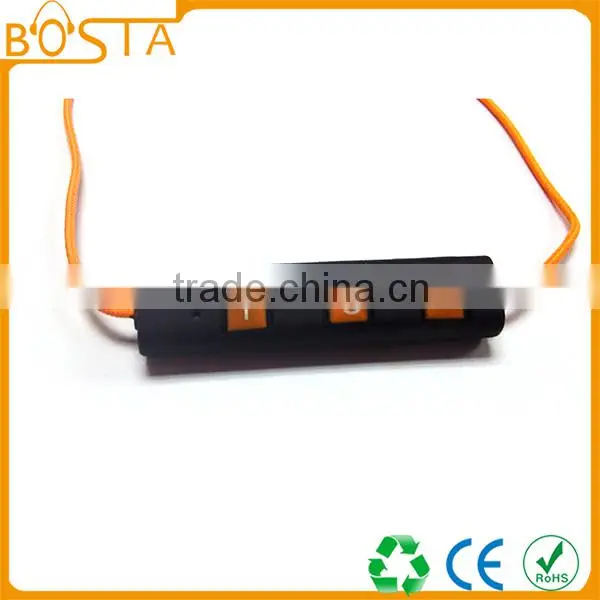 Sports sweat-proof wholesale shiny orange soft ruberized string bluetooth earphones