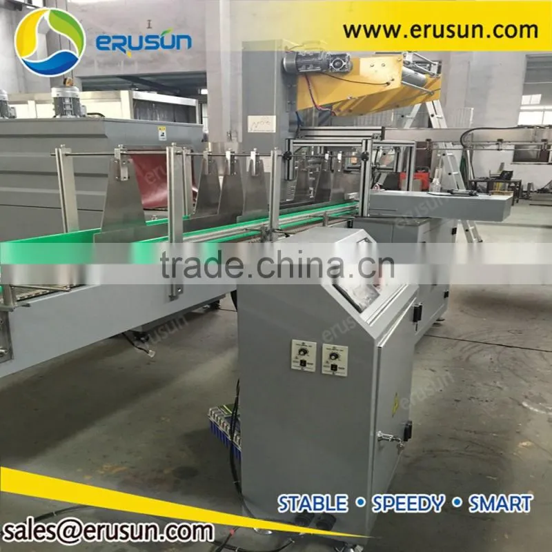 Automatic shrink wrapping machine with shrink tunnel