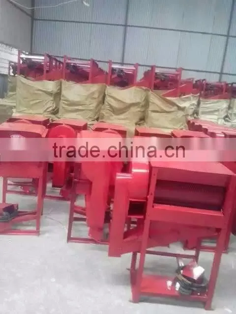 Movable mini paddy grain thresher