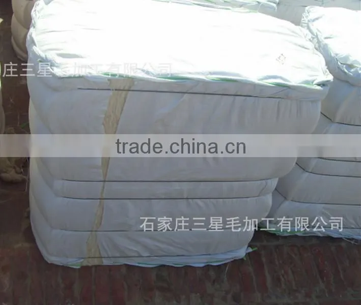England scoured 30-34mic 60-100mm carpet grade wool