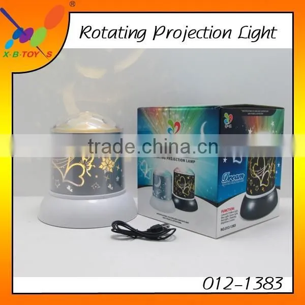 Hot selling New Year Gift Rotating Projection Light LED Change colors Projector Night Light with 4 pcs Batteries or USB Line