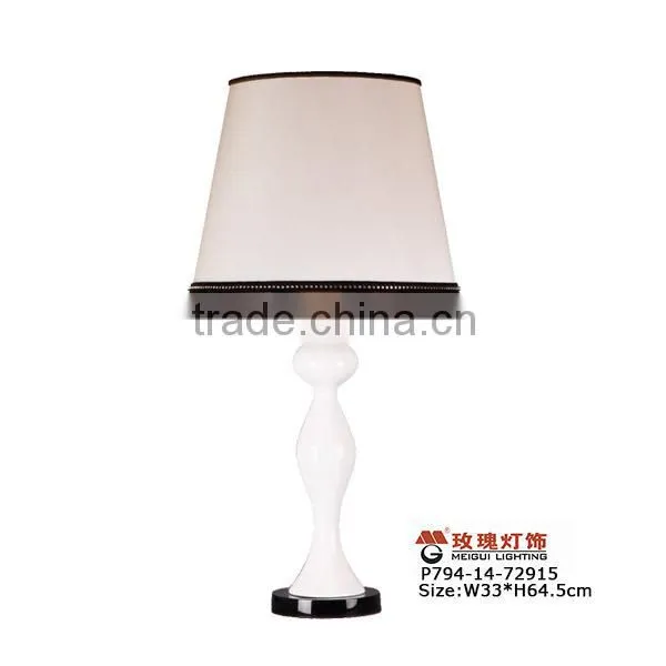 white modern standing lamp with acrylic base